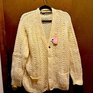 Cream hand knit in New Zealand. Beautiful condition